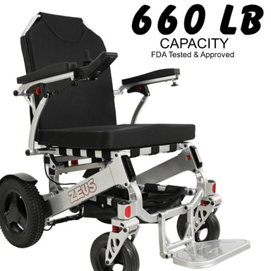 Zeus Heavy Duty Folding Electric Wheelchair in silver, front right view, weight capacity