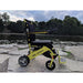Air Hawk Foldable Electric Wheelchair in yellow, outside