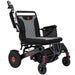 Black and gray electric wheelchair with visible branding on a white background
