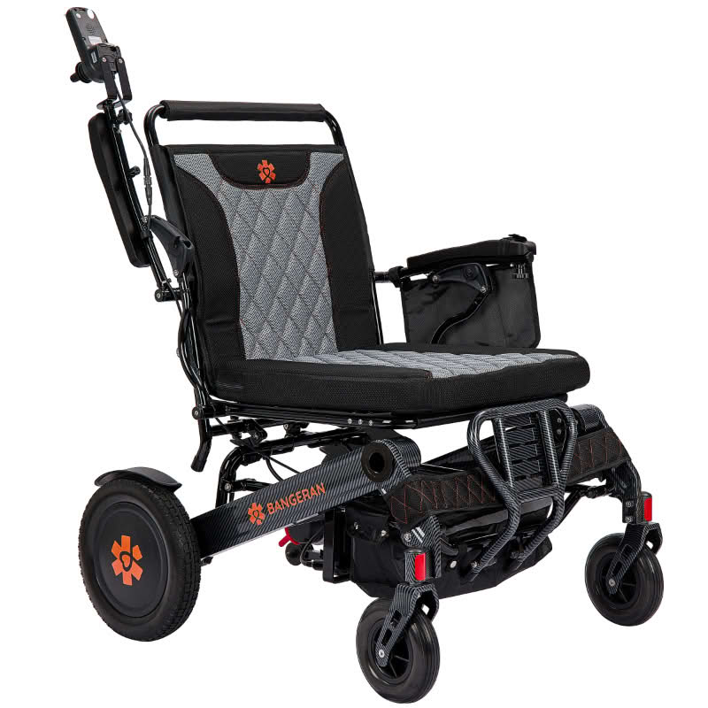 Black and gray electric wheelchair with visible branding on a white background