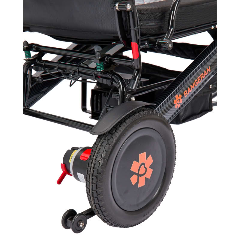 Close-up of a wheelchair with visible branding on a white background