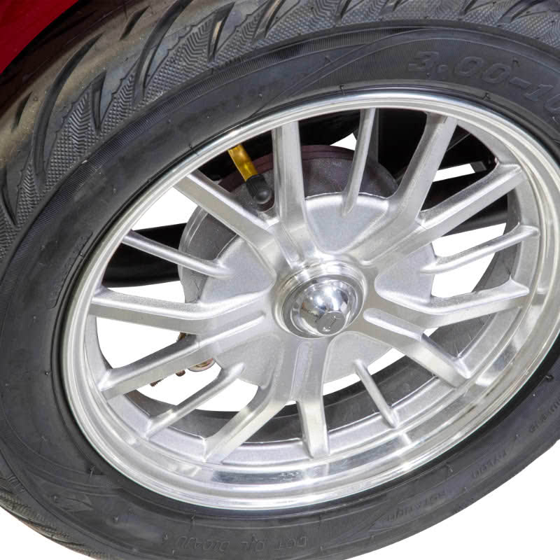 Platinum 4-Wheel Scooter in red, rear wheel close up 