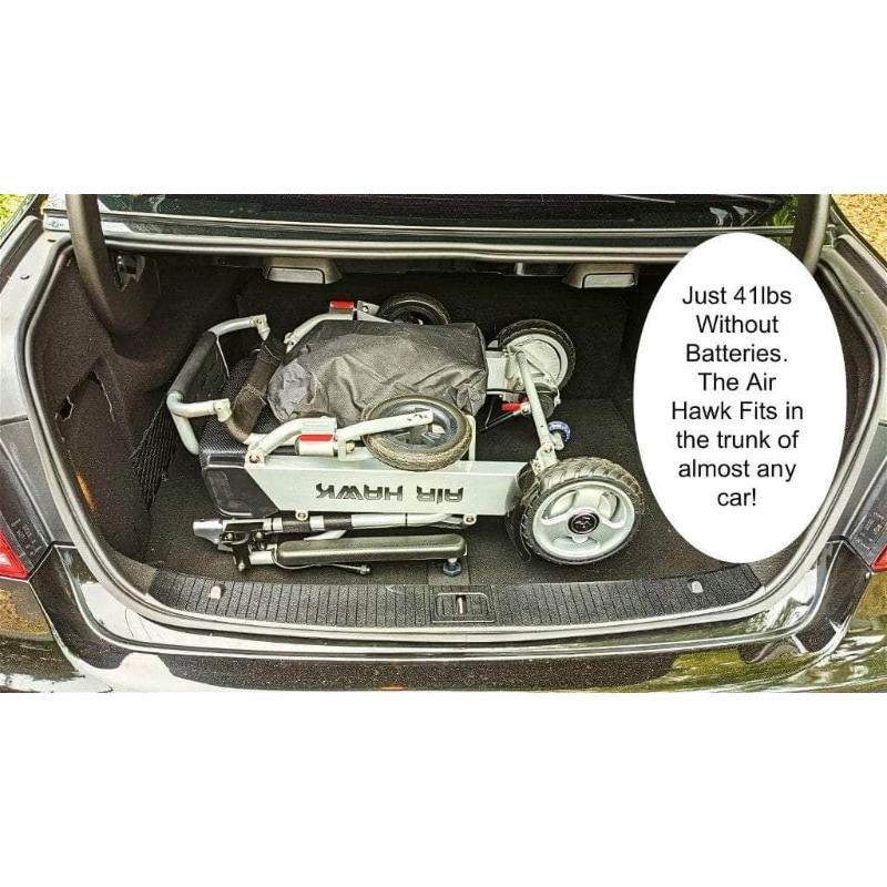 Air Hawk Foldable Electric Wheelchair in silver, folded, weight listed